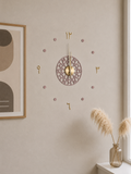 dekoratives Wanduhr med islamisch inspireret design in Goldoptik, valnød, rund