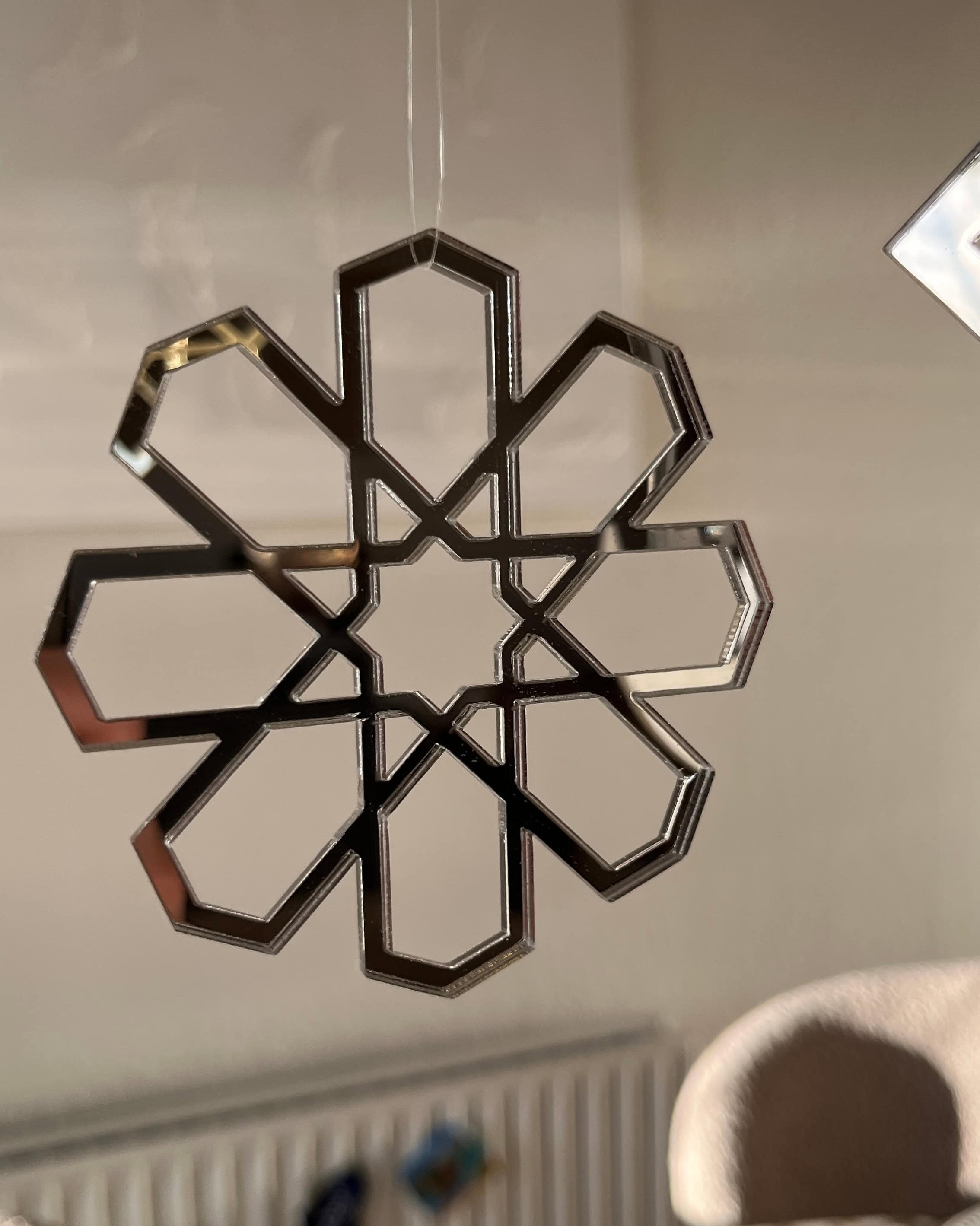 Geometrisk ophæng i solv som hængende dekoration i hjemmet