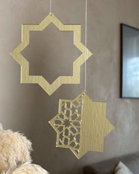 Stjerne ophæng i guld spejlakryl som dekorativ pynt til Ramadan og Eid